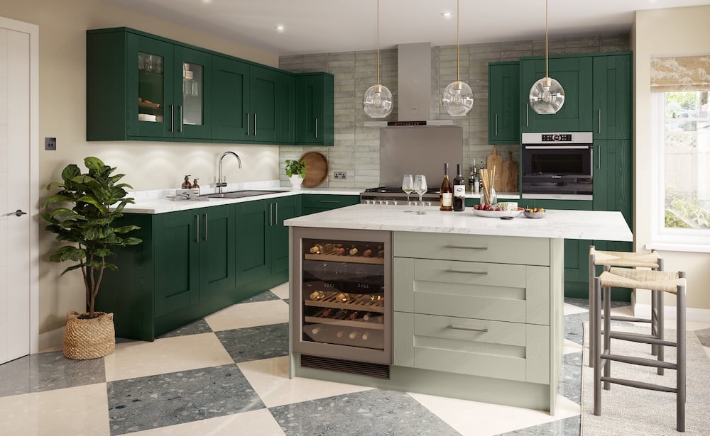 Green fitted kitchen with island